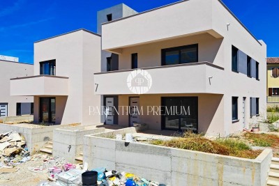 A new modern apartment in a sought-after location with a roof terrace and a beautiful view - under construction