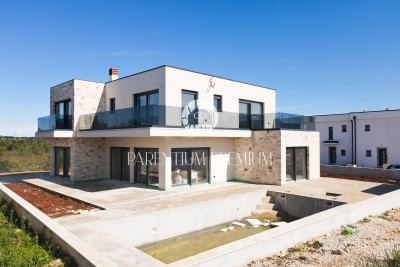 A new modern villa with a swimming pool in a nice tourist location
