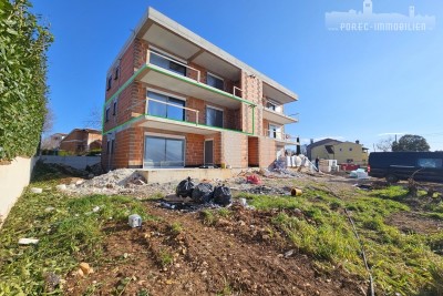 Stan sa dvije spavaće sobe i pogledom na more, na prvome katu moderne zgrade - u izgradnji