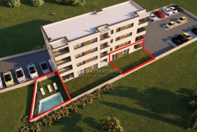 Stan sa bazenom i vrtom u prizemlju novogradnje za ugodan odmor