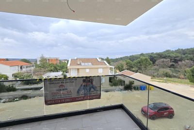 Ližnjan. Novogradnja. Prodajemo stan s  pogledom na more.