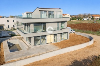 Modern villa with four bedrooms, just 3 km from the center of Poreč - under construction