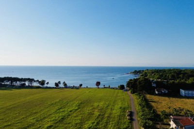 UMAG, BAŠANIJA, ATRAKTIVNO GRAĐEVINSKO ZEMLJIŠTE 250 METARA OD MORA