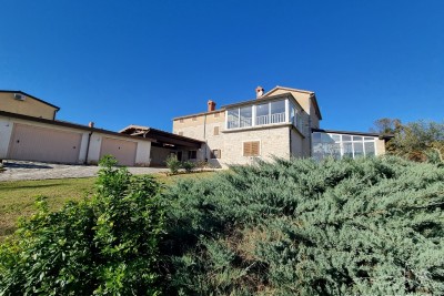 A magnificent abode nestled in a vast estate - a true epitome of grandeur and elegance.