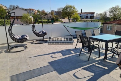 Appartamento al primo piano con terrazza sul tetto