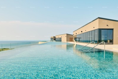 Luksuzni resort s krovnim infinity bazenom!